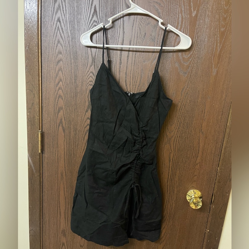Black small mini dress just need to iron it and it’s pretty just too small on me